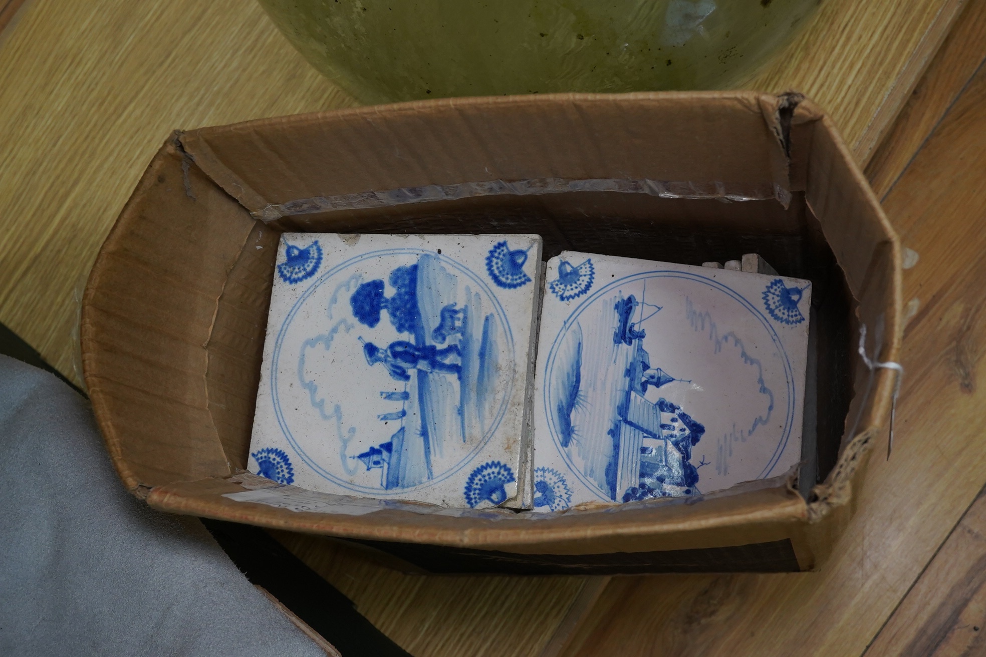 A quantity of 19th century blue and white Delft tiles, approximately 13 x 13cm. Condition varies